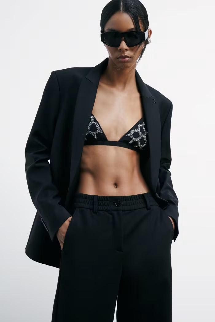 REGGISENO CON RICAMI